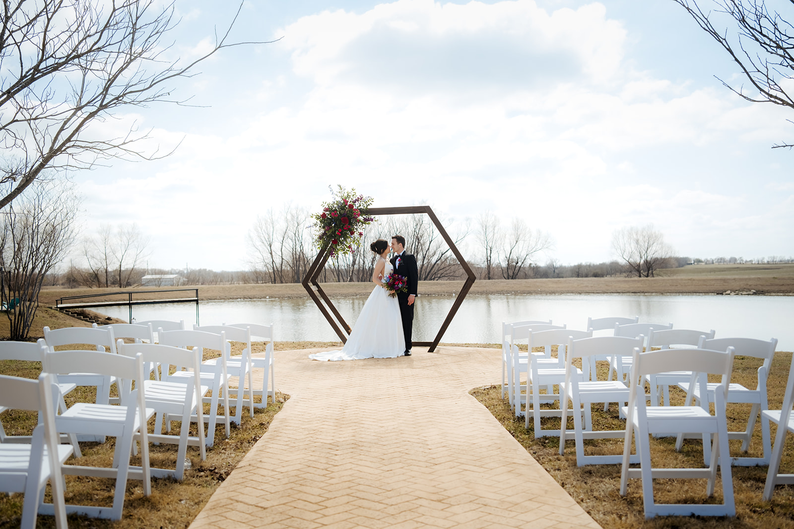 wedding couple at a lakeside ceremony